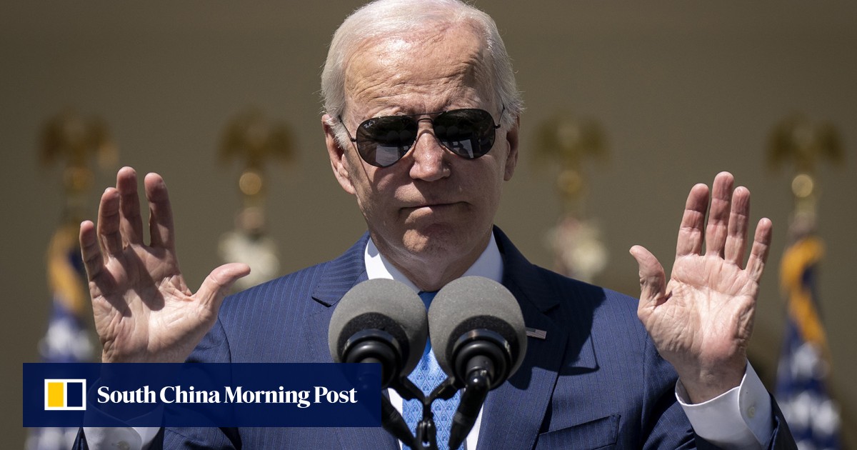 Biden signs Pentagon budget bill that extends sanctions on Hong Kong officials