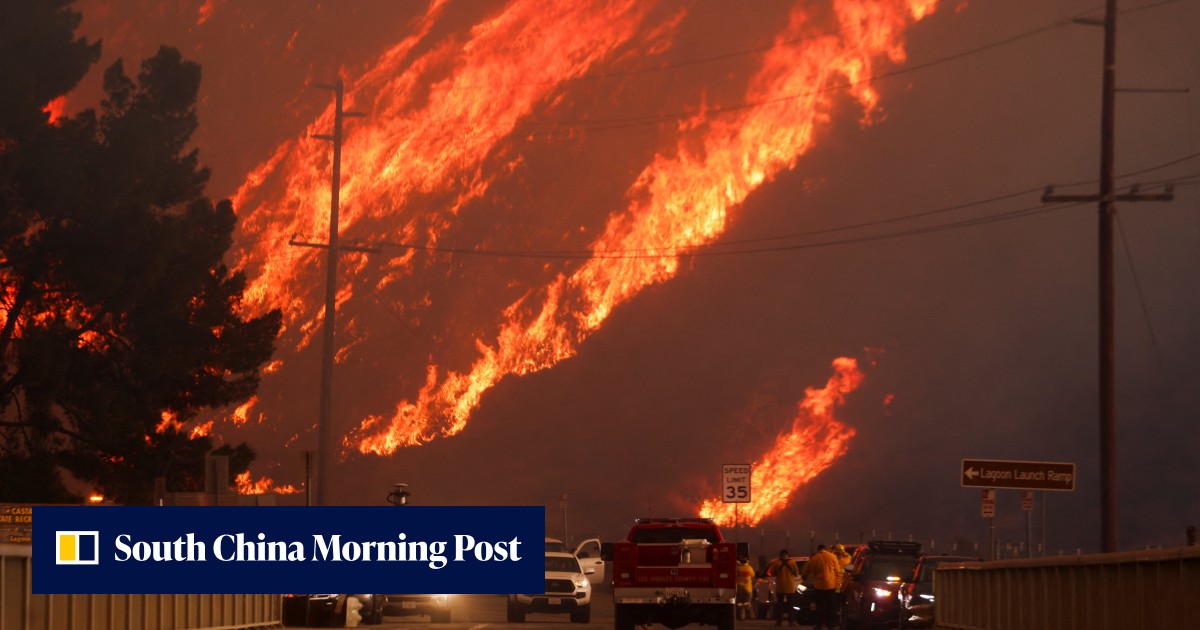 Explosive new wildfire erupts near Los Angeles, forcing thousands to ...