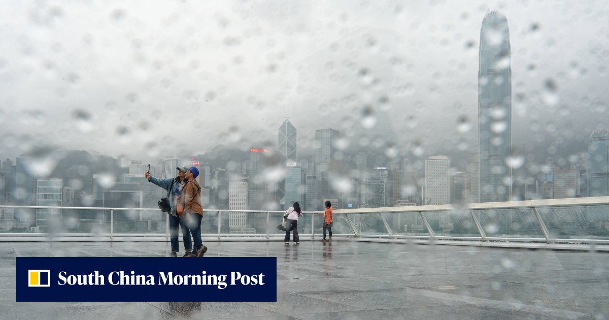 Low visibility as fog blankets Hong Kong amid band of rain and clouds ...