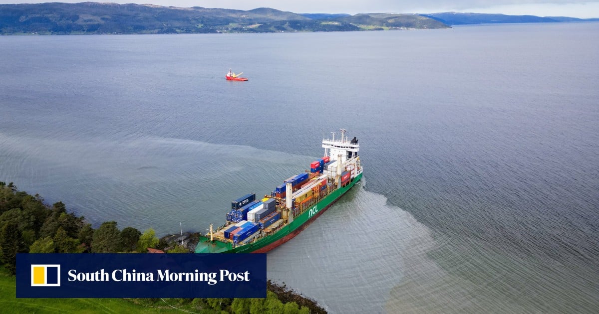 Norway cabin owner sleeps on as cargo ship runs aground outside