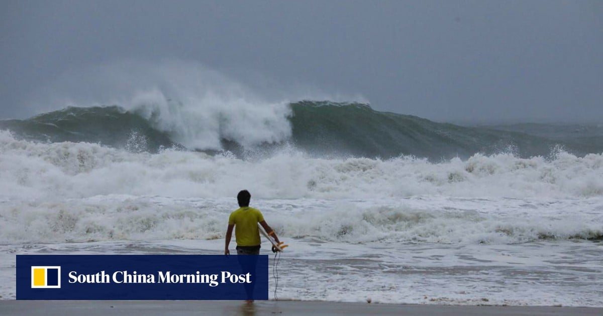 Hong Kong surfing coach slammed after claiming he’s riding waves during Typhoon Wipha