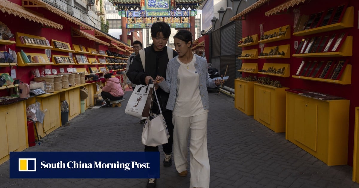 China’s economy shows signs of strain as retail sales, output lose momentum