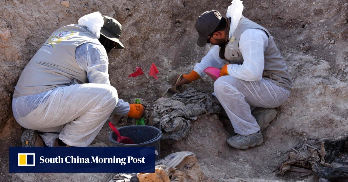 Iraq starts work on IS mass grave thought to hold thousands of bodies
