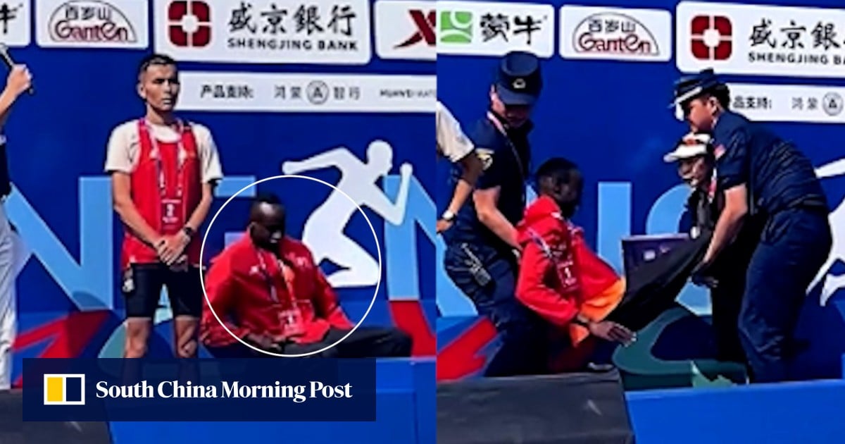 Marathon winner in China faints on podium