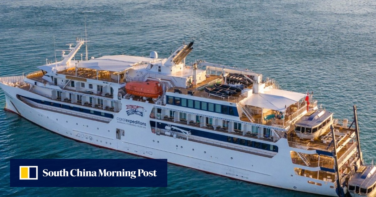 Australian cruise cancelled after woman left behind on island dies