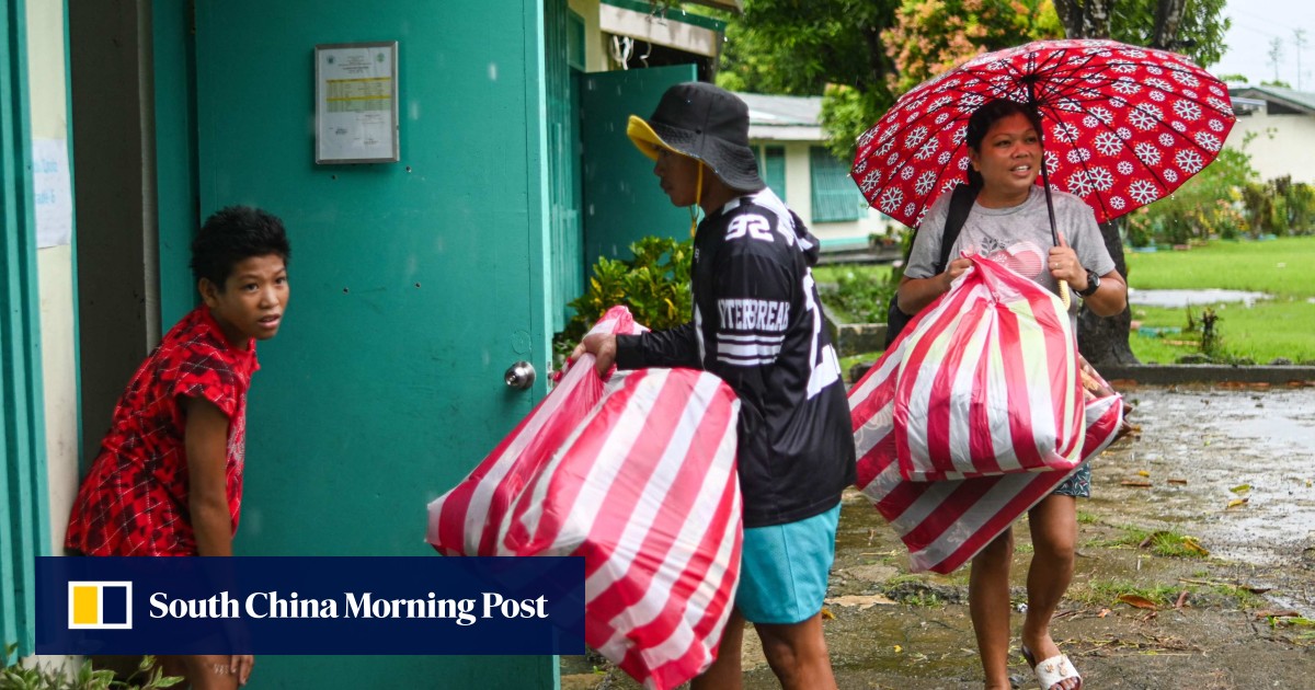 Tens of thousands shelter as Typhoon Kalmaegi slams into the Philippines