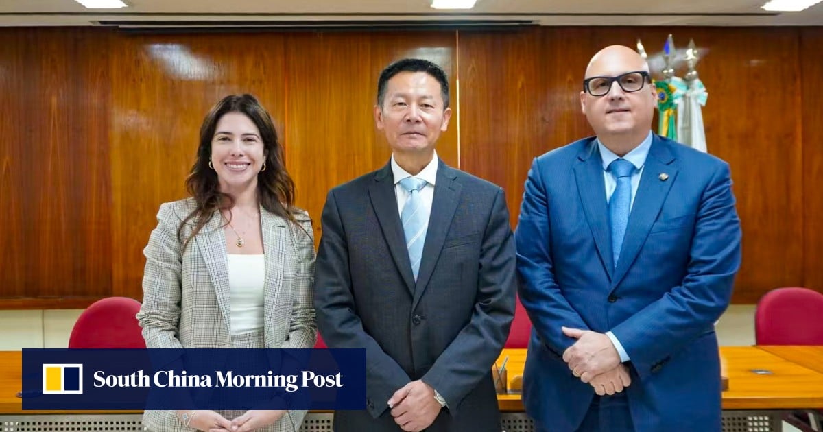 China’s market regulator appears in public after resignation report