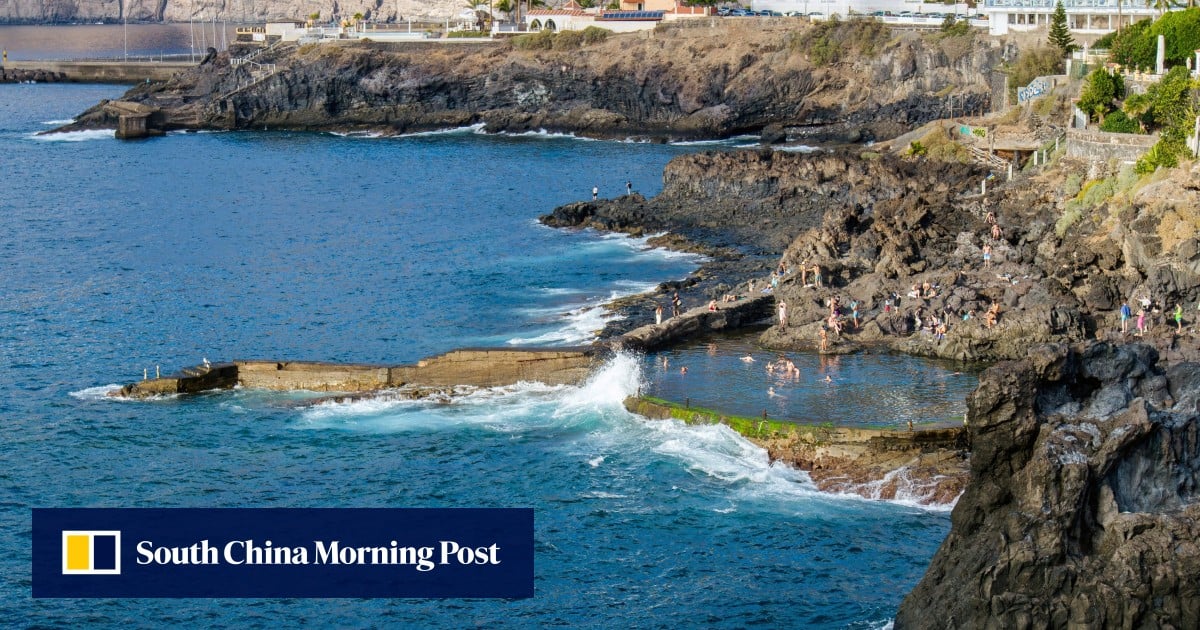 Powerful wave at Spanish tourist island sweeps swimmers to sea, killing 4
