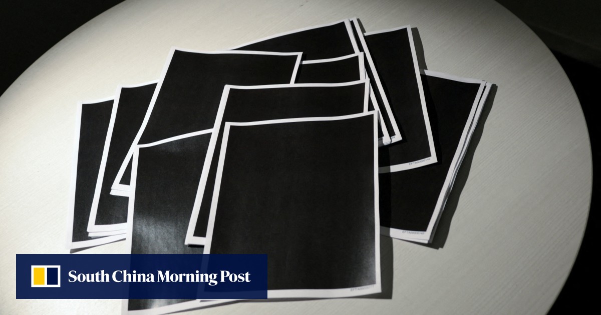 US Justice Department denies cover-up as Trump photo restored to Epstein files