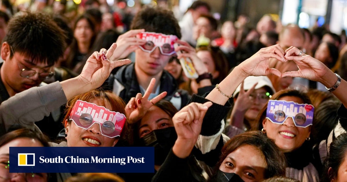 New Year’s Eve revellers hope for peace as crowds flock to Hong Kong lights show