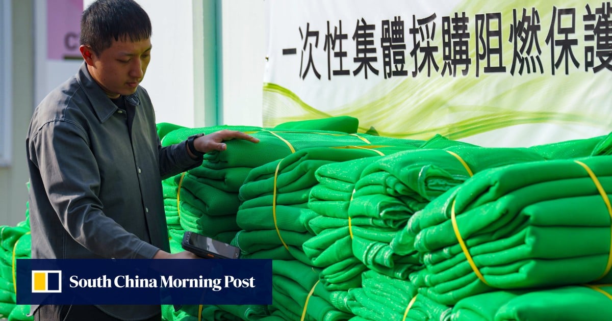 Stalled work to resume as Hong Kong distributes 3,000 fire-tested scaffold nets