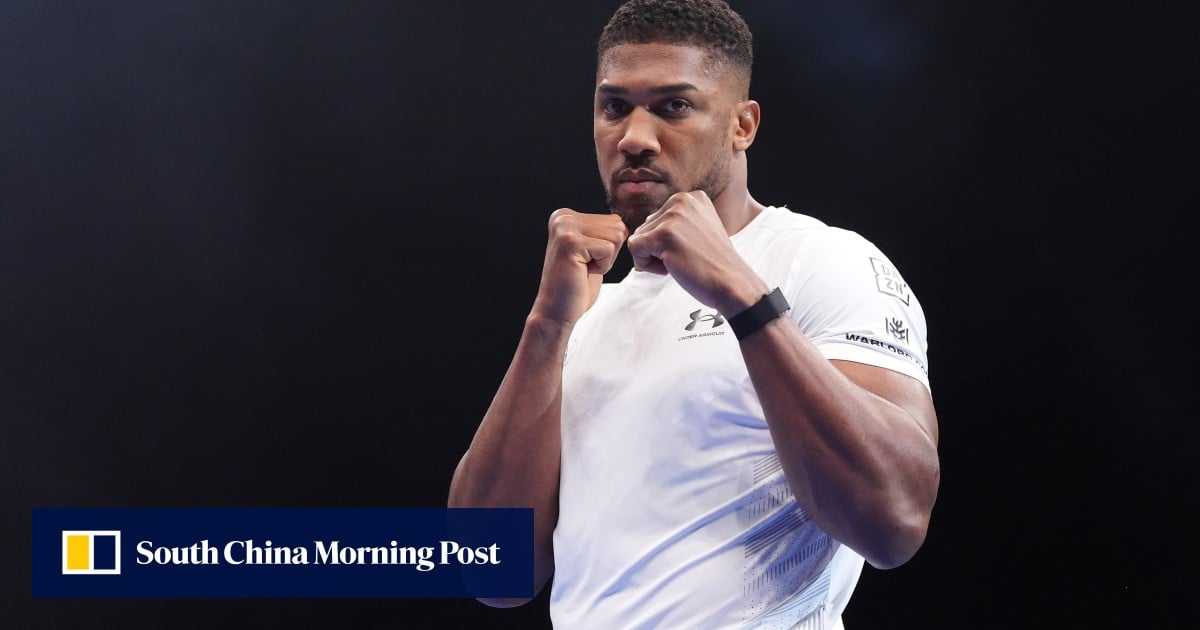 Anthony Joshua returns to gym following car crash that killed two of his close friends