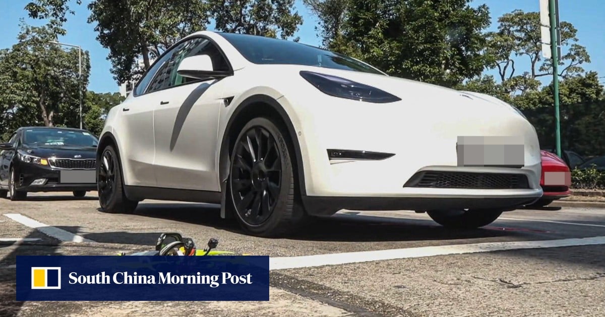 Hong Kong driver avoids injury after drone crashes onto Tesla roof