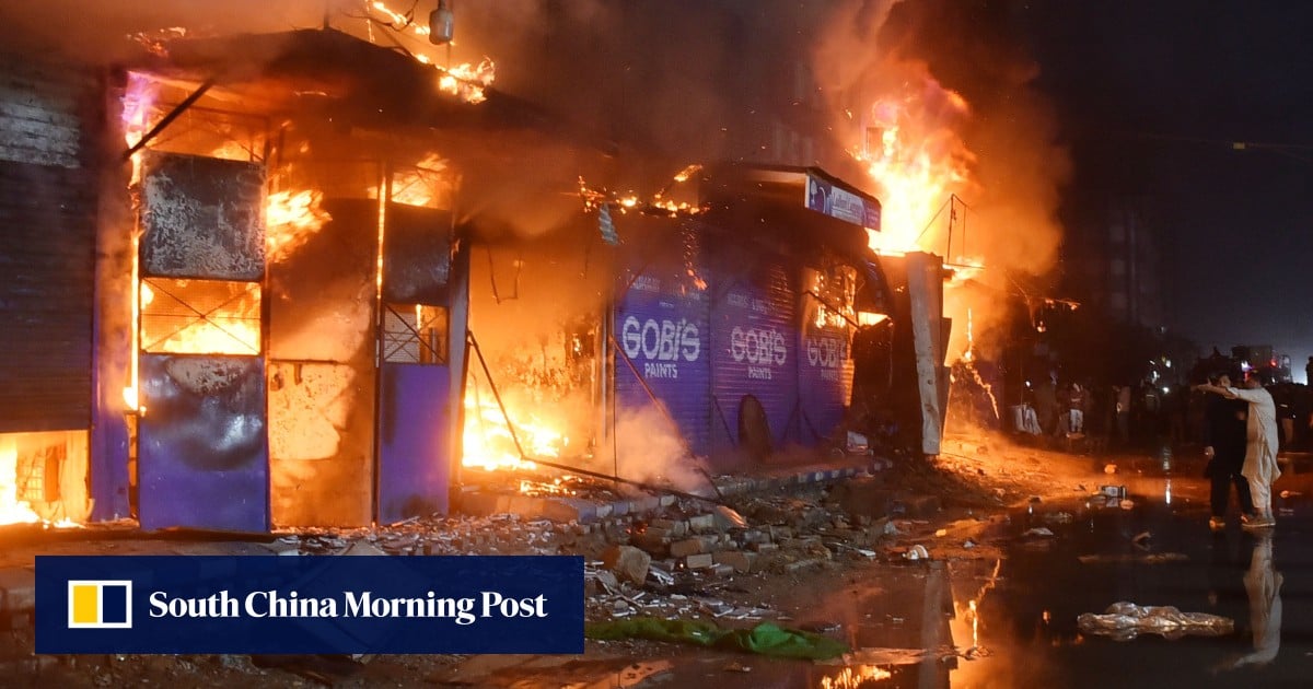 11 dead, over 60 missing after Pakistan shopping centre fire smoulders for 24 hours