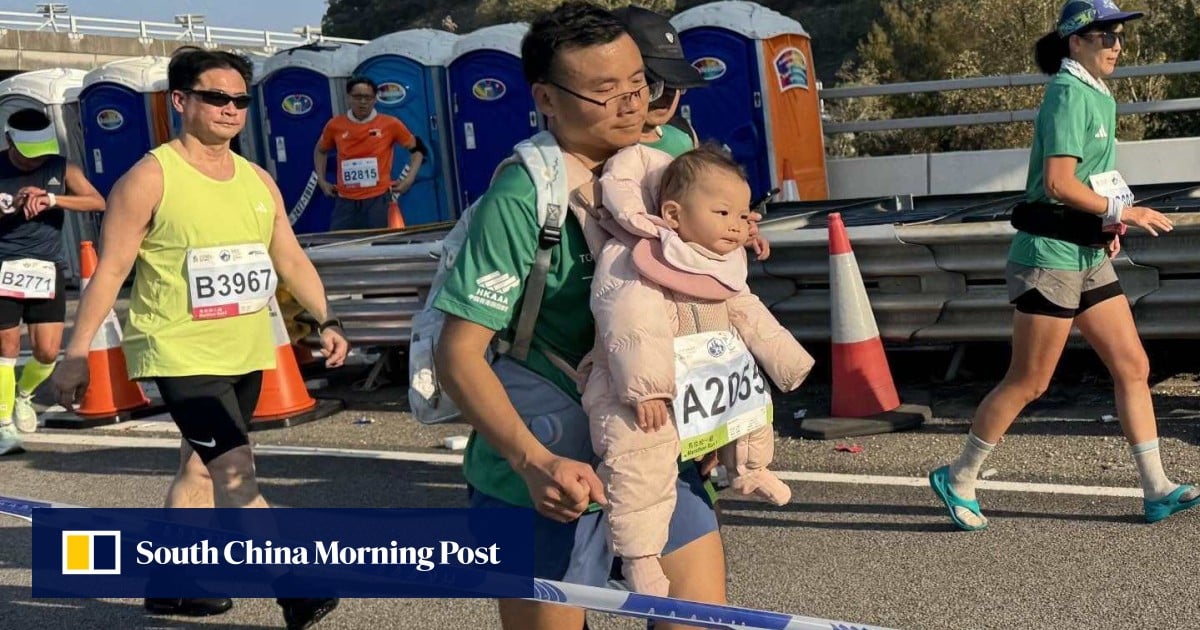 Man spotted running while carrying baby in Hong Kong Marathon was stopped, told to leave