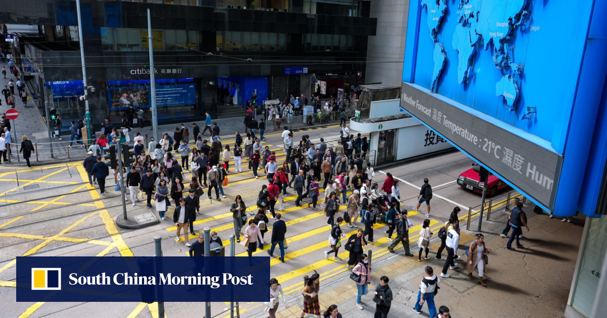Hong Kong business confidence hits 2-year high, survey finds