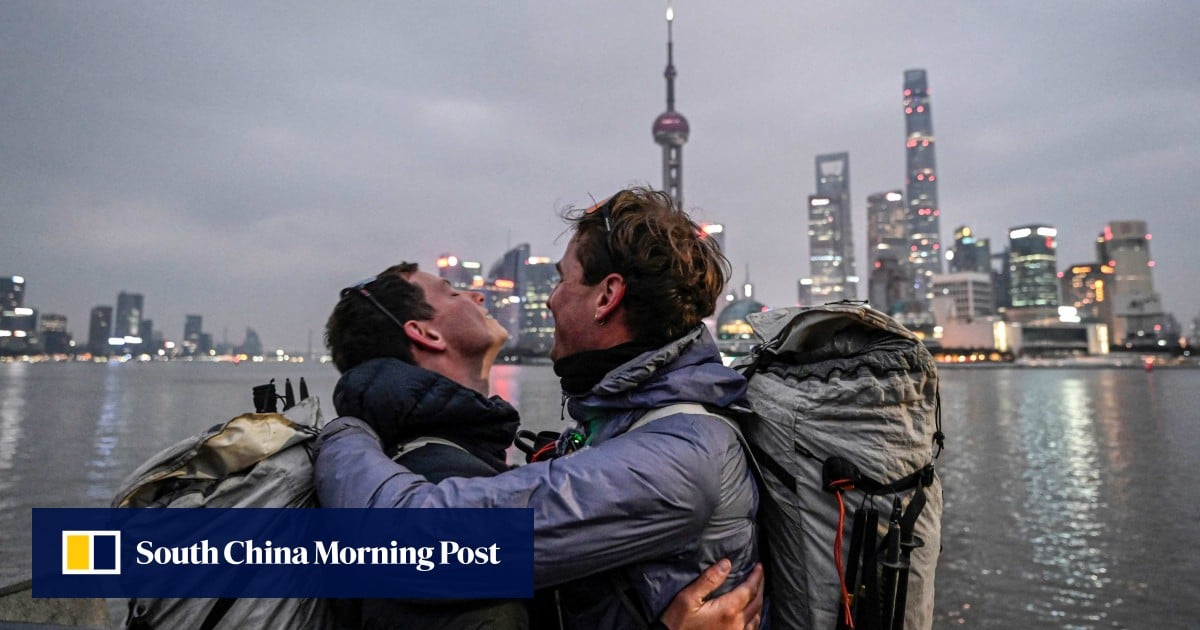 French duo reach Shanghai, China, after walking over 12,000km in 518 days