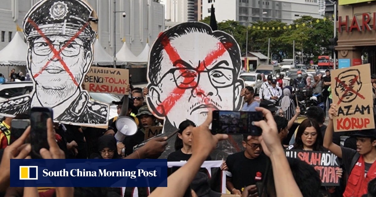 Hundreds of Malaysians rally to demand arrest of anti-corruption head: ‘enough is enough’
