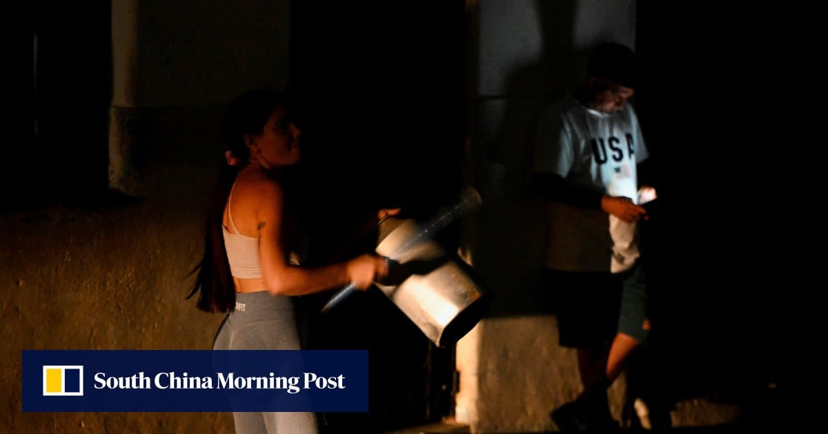 Protesters in Cuba attack Communist party office amid blackout fury
