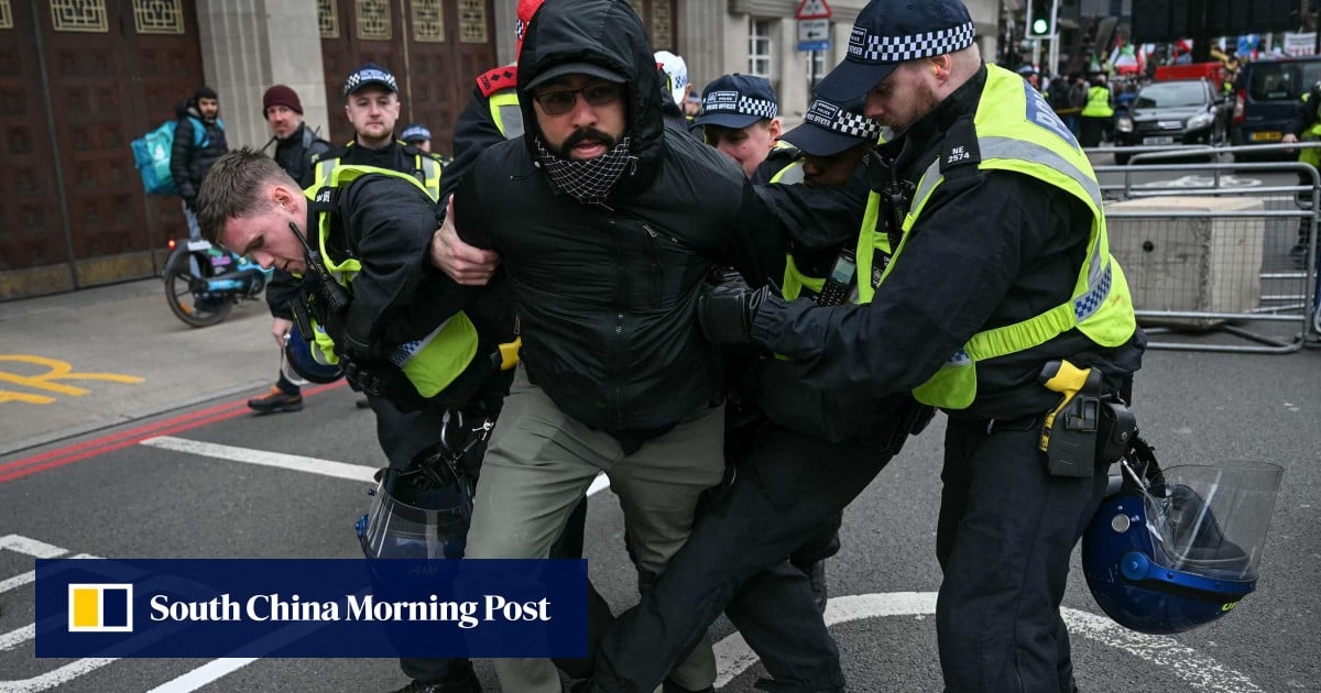 Police arrest 12 as hundreds join banned pro-Palestinian march in London