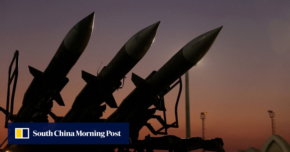 Trump warns of 50% tariffs on arms suppliers to Iran