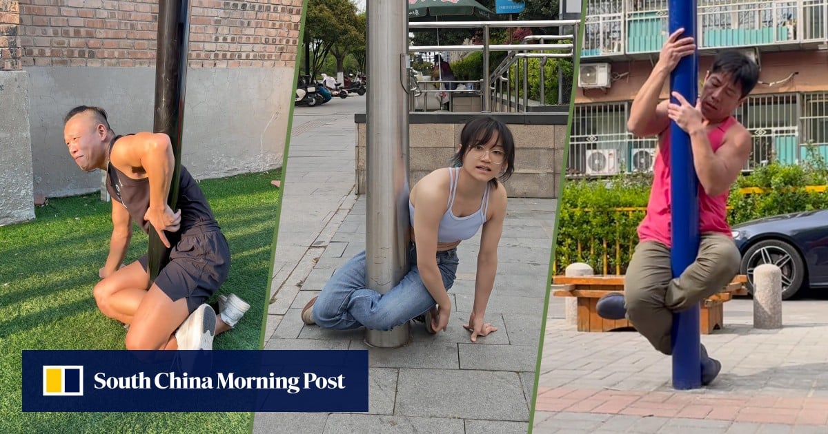 Climbing lamp posts cross-legged challenge goes viral in China with players often needing rescue