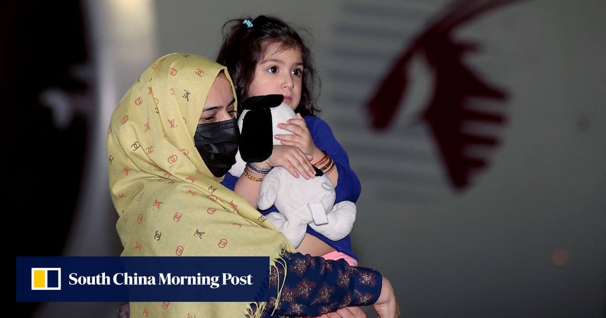 Taliban says Afghans stuck in Qatar who helped US in war can safely return home