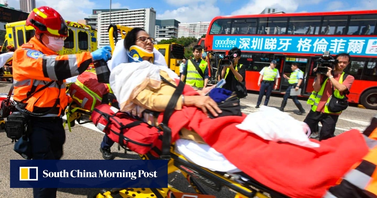 24 injured after double-decker KMB bus crashes into highway maintenance truck