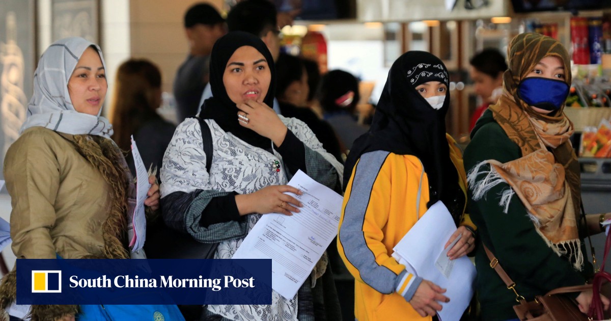 Homesick Filipino migrants count cost of separation for a ‘better’ future