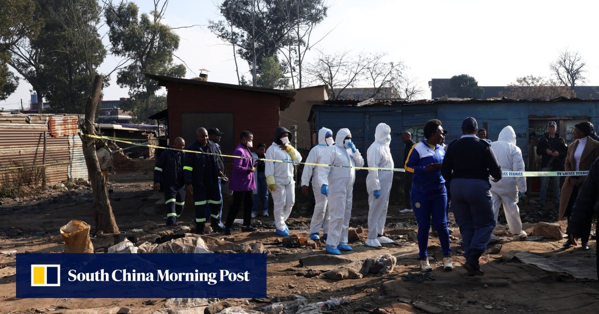 Manhunt in South Africa for attackers who killed 12 in mass shooting