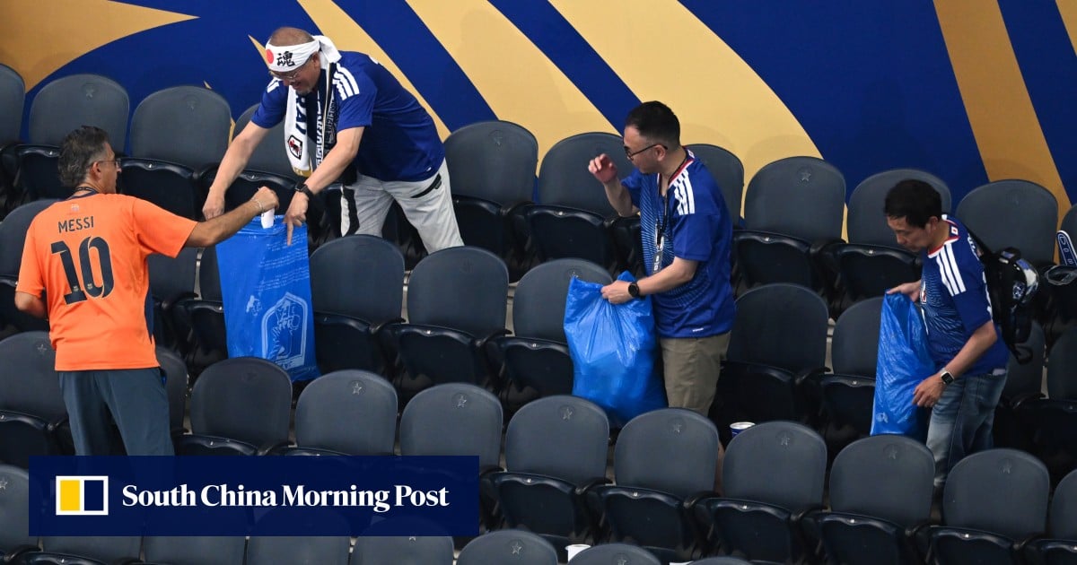 ‘It’s our way’: Japan fans win hearts by cleaning up after World Cup match