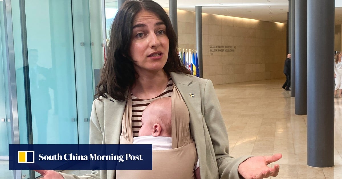 Swedish minister brings baby to EU meeting, a first for the bloc Swedish minister brings baby to EU meeting, a first for the bloc