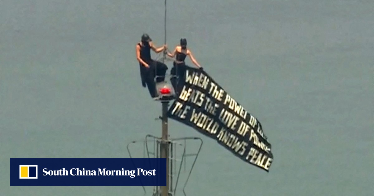 2 arrested after hanging ‘power of love’ banner on top of Empire State Building