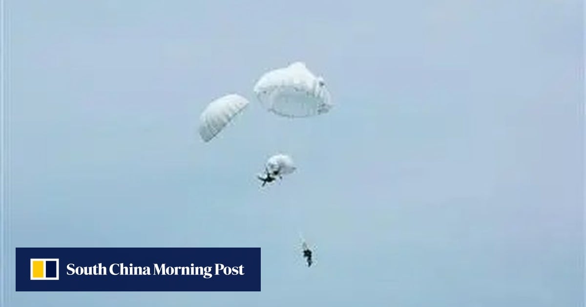 Chinese paratrooper saves unconscious comrade in dramatic mid-air chute emergency