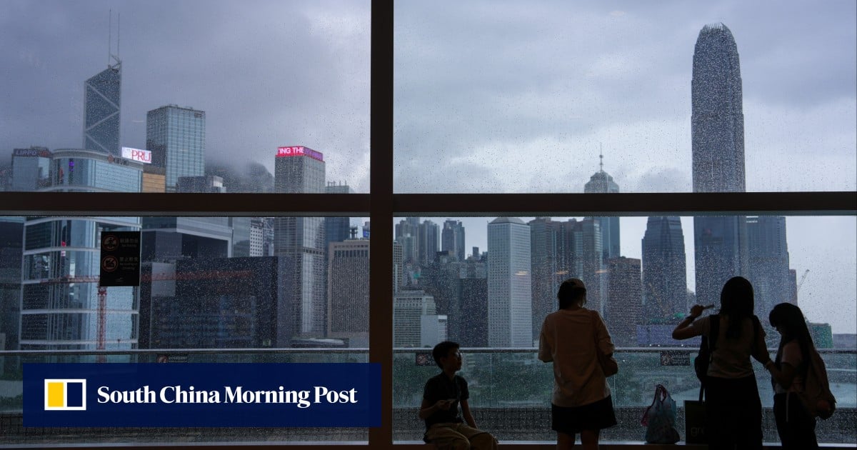 Hong Kong lowers red rainstorm warning to amber after morning class suspension
