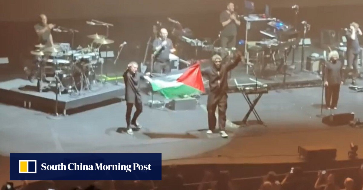 Massive Attack barred from Singapore for unfurling Palestinian flag on stage