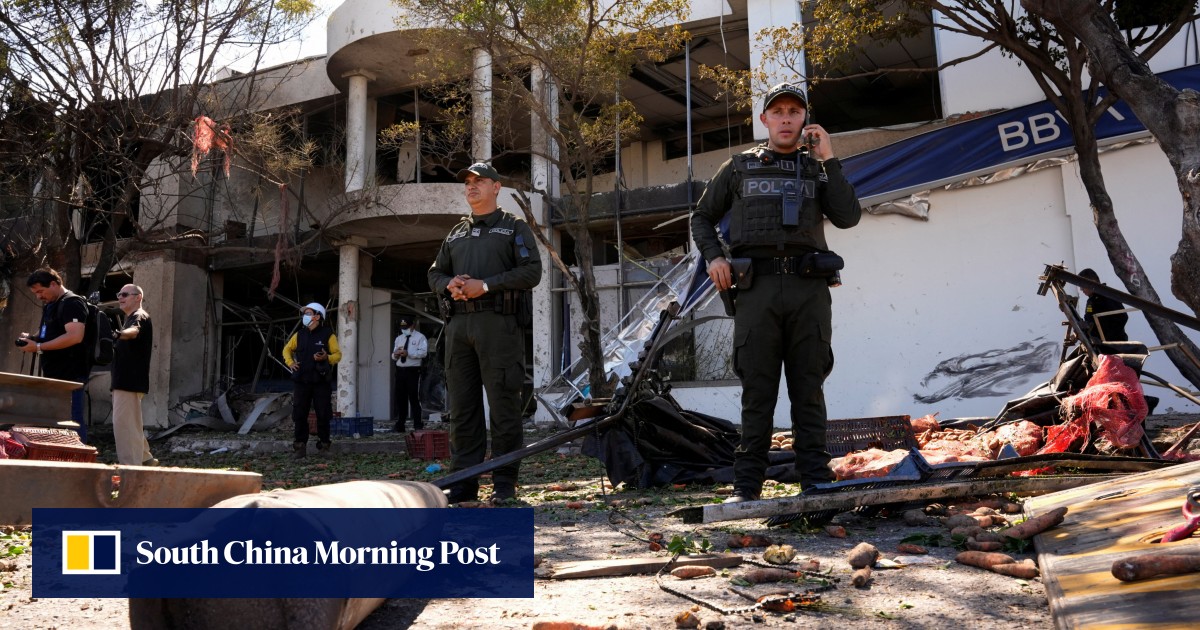 Truck explodes outside Colombia police base, injuring 11 officers and killing a dog
