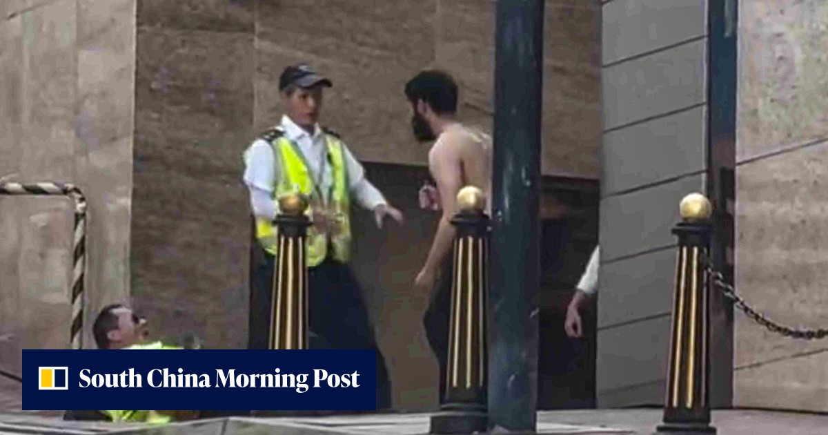 Man with knife arrested after allegedly injuring 2 at Hong Kong housing estate
