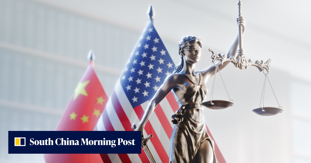 Statue of Lady Justice with US and Chinese flags behind it.
