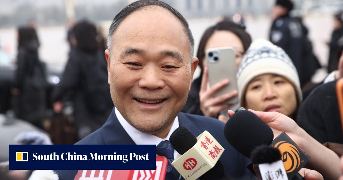 Billionaire Geely Auto head Li Shufu steps down as profit slips