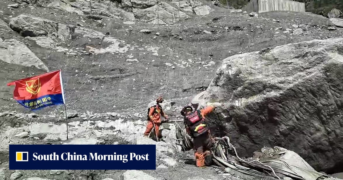 Chinese rescuers reach checkpoint destroyed by deadly flash floods along Nepal border