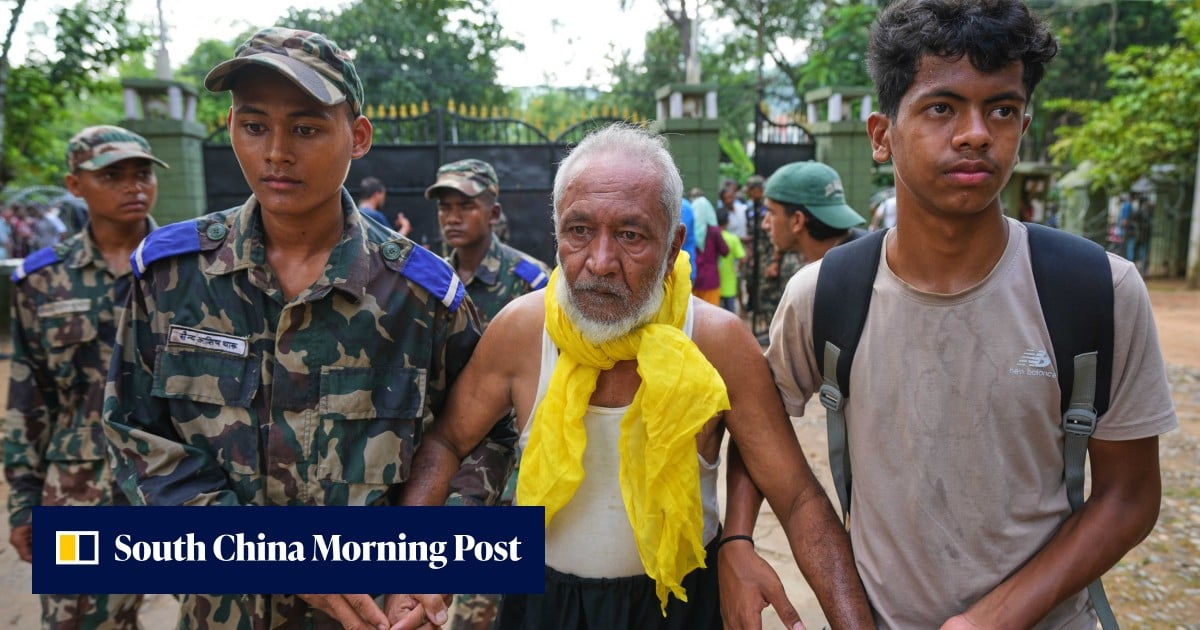 China-Nepal floods: rescuers pull out survivors caked in mud as toll climbs