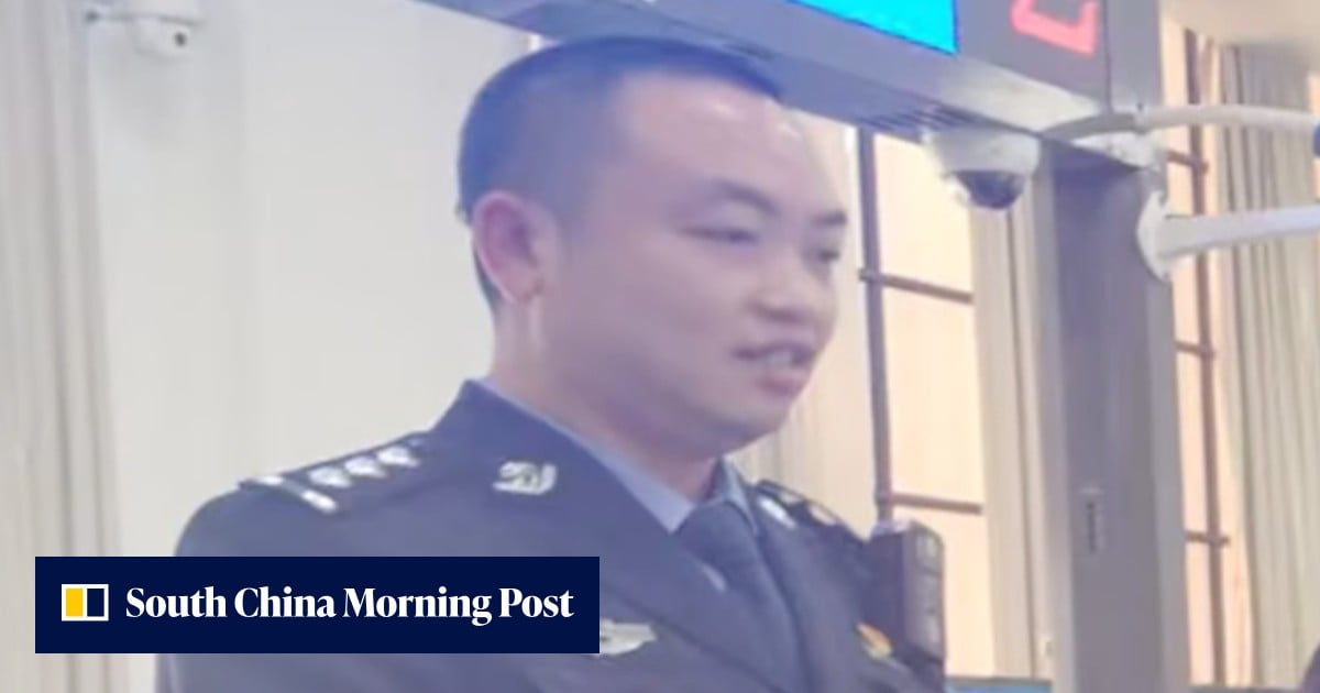 China-Nepal floods: police officer filmed guiding people away from stricken border post