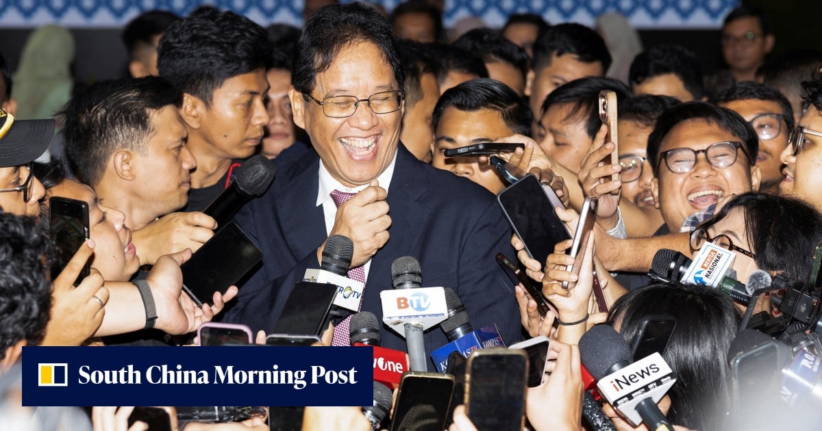 Indonesian finance minister notified of his firing in mid-meeting call