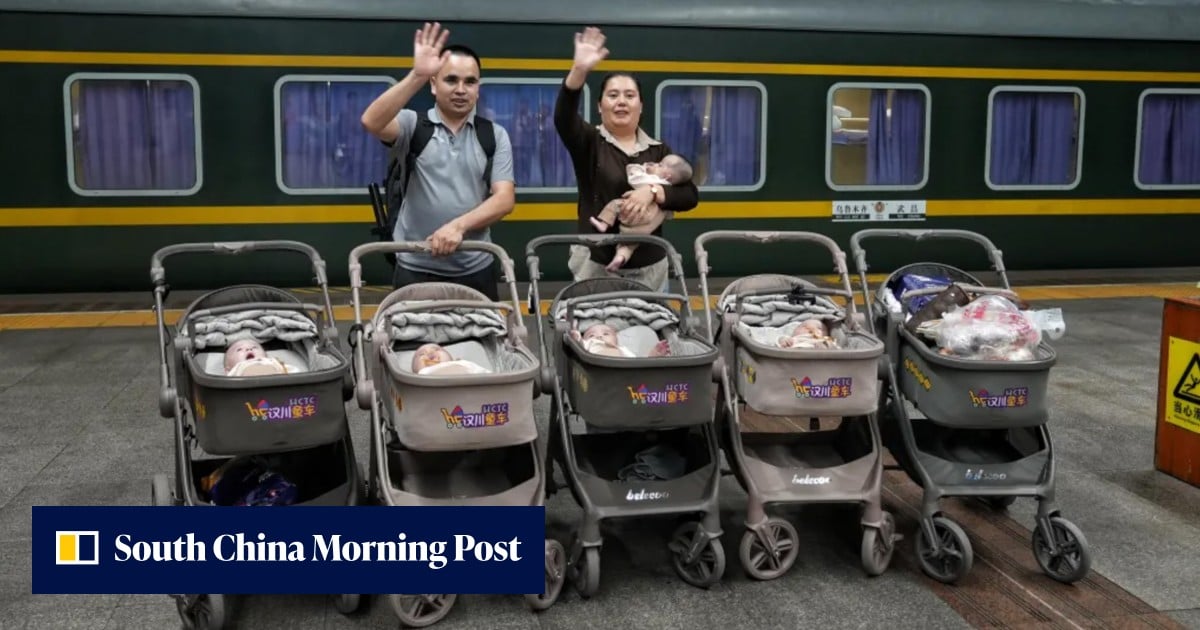 Strangers and railway staff help Chinese couple bring quintuplets home by train