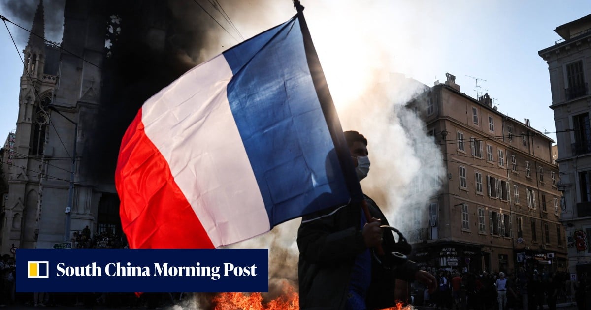Hong Kong issues amber travel alert for France as school protests turn violent