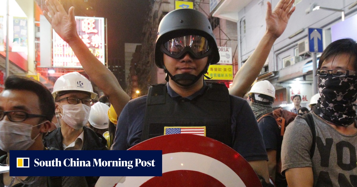 Men who burned cardboard and threw bottles at police during Mong Kok ...