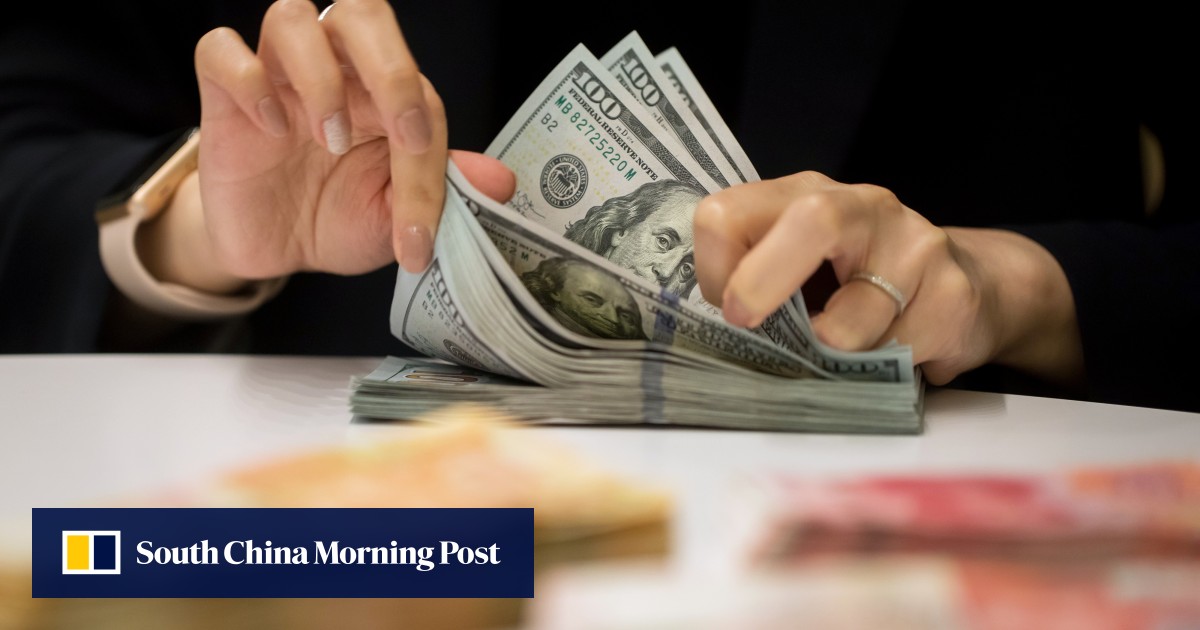 Chinese banks quietly lower daily limit on foreign-currency cash withdrawals