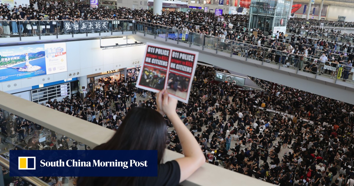 Protest cripples airport as Beijing raises stakes with ‘terrorism’ warning