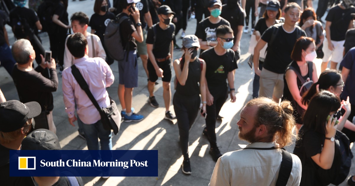 Foreigners who fly in to join Hong Kong protests say they’re not